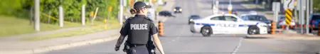 Female Peel Police Officer blocking traffic