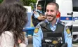 Prisoner Escort employee happily talking to member of the public