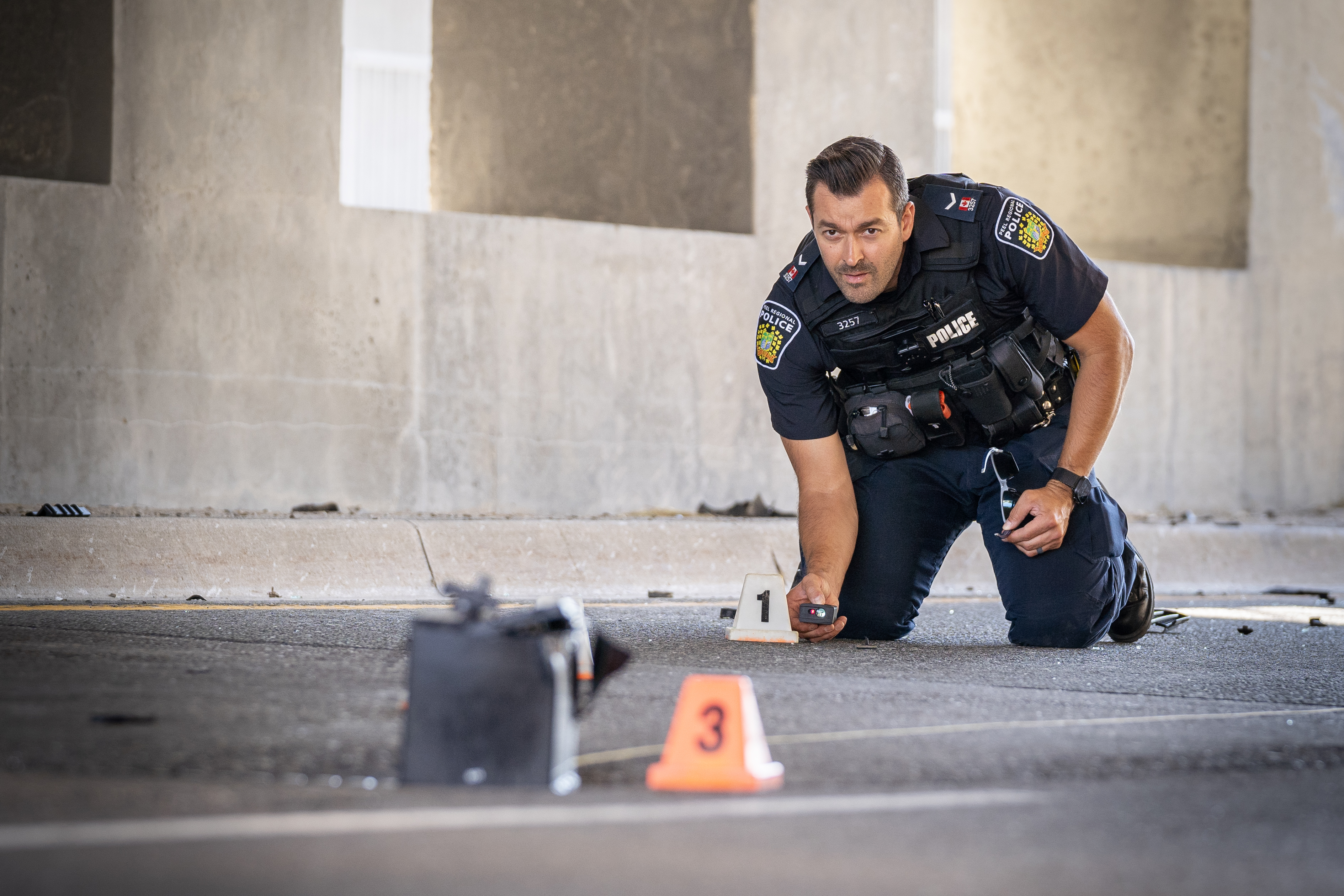 Police officer marking evidence