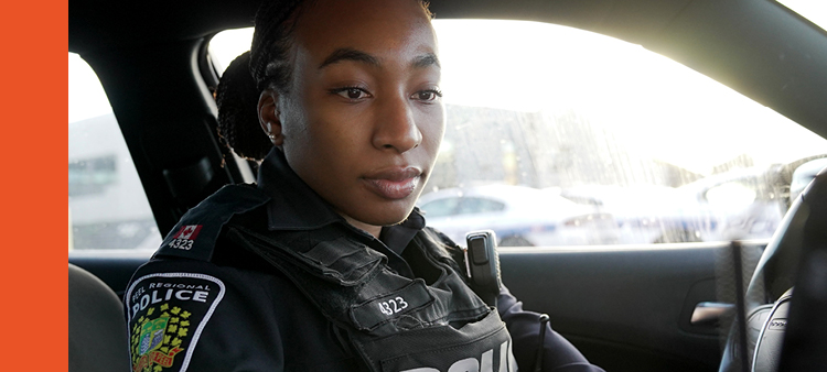 Female police officer in car
